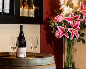 bottle of wine and flowers at orestone manor bottle of wine and flowers at orestone manor
